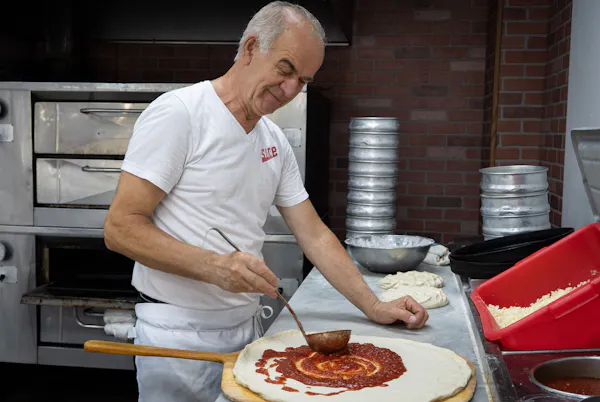 Throwing the dough at Pizza Mia in Staten Island